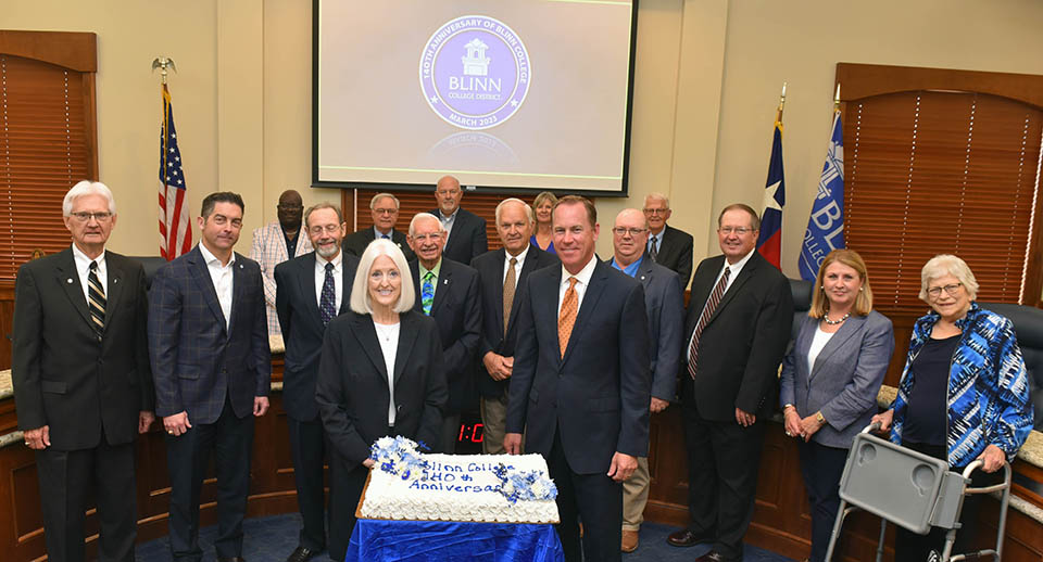 Former president Dr. Donald Voelter and former trustees help the College celebrate historic milestone